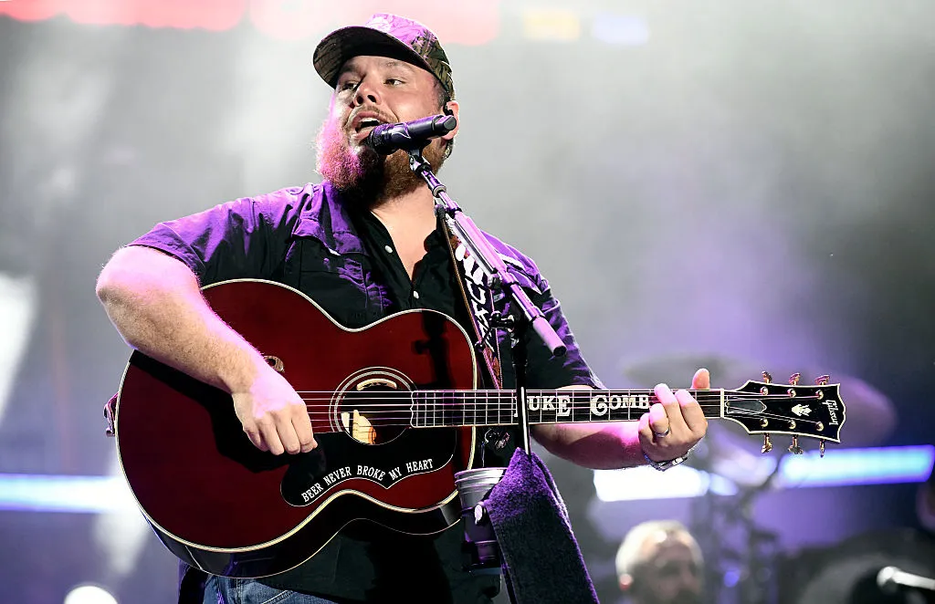 Luke Combs performing live on stage